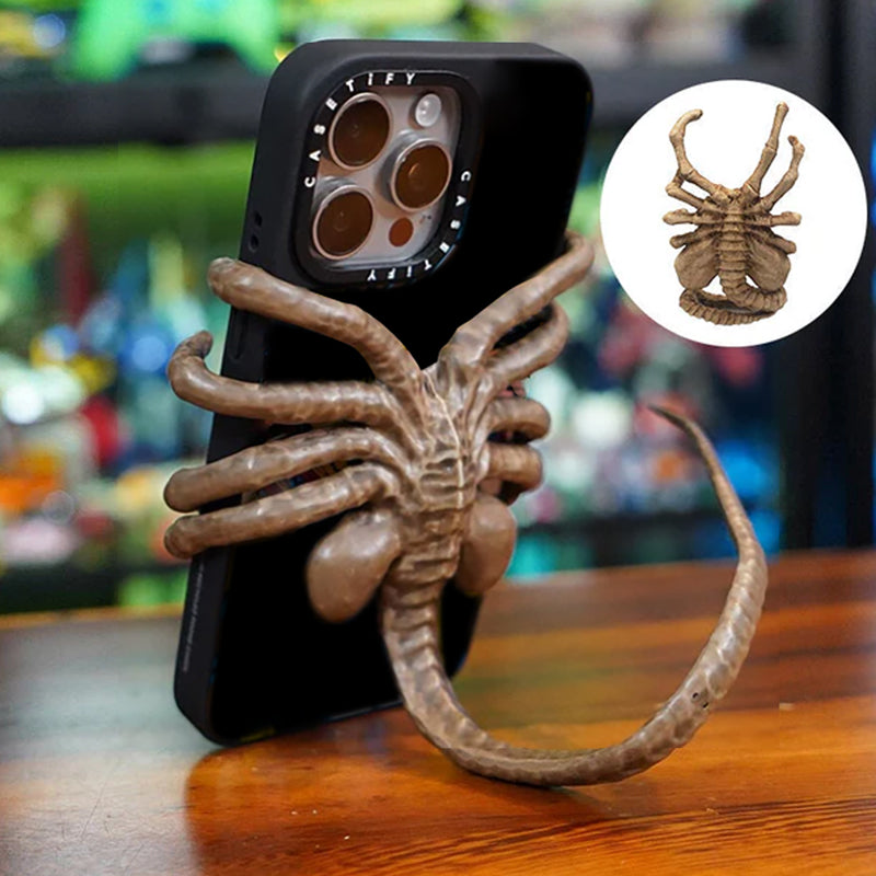 Verschrikkelijke Facehugger-telefoonhouder