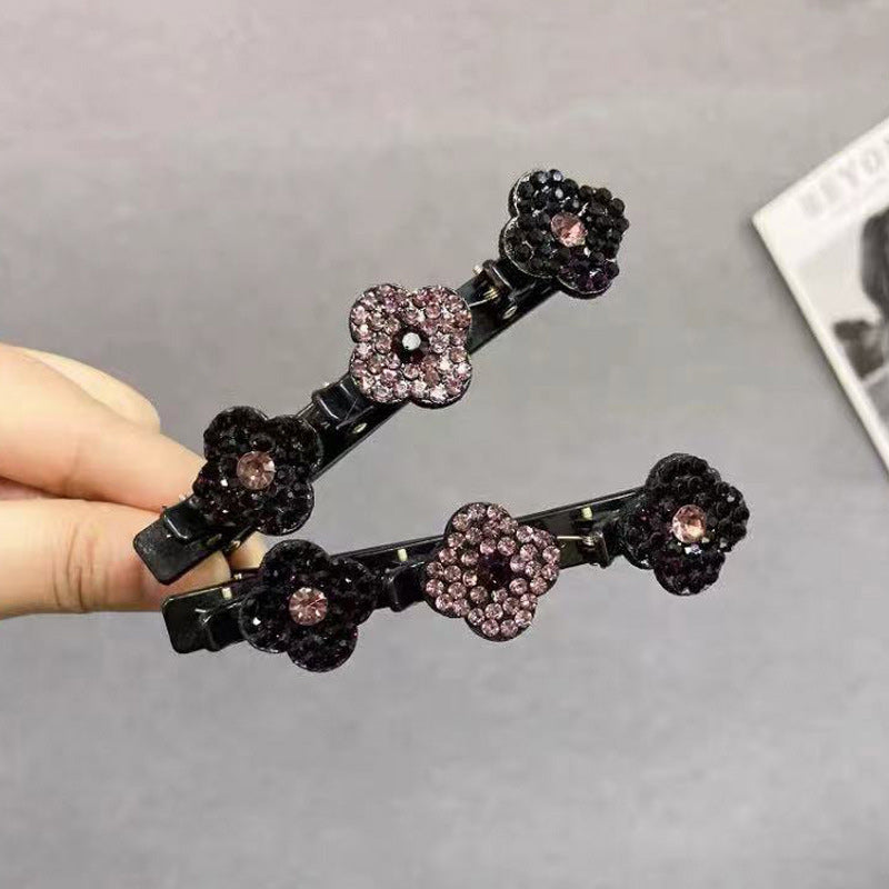 Haarclip met drie bloemen aan de zijkant