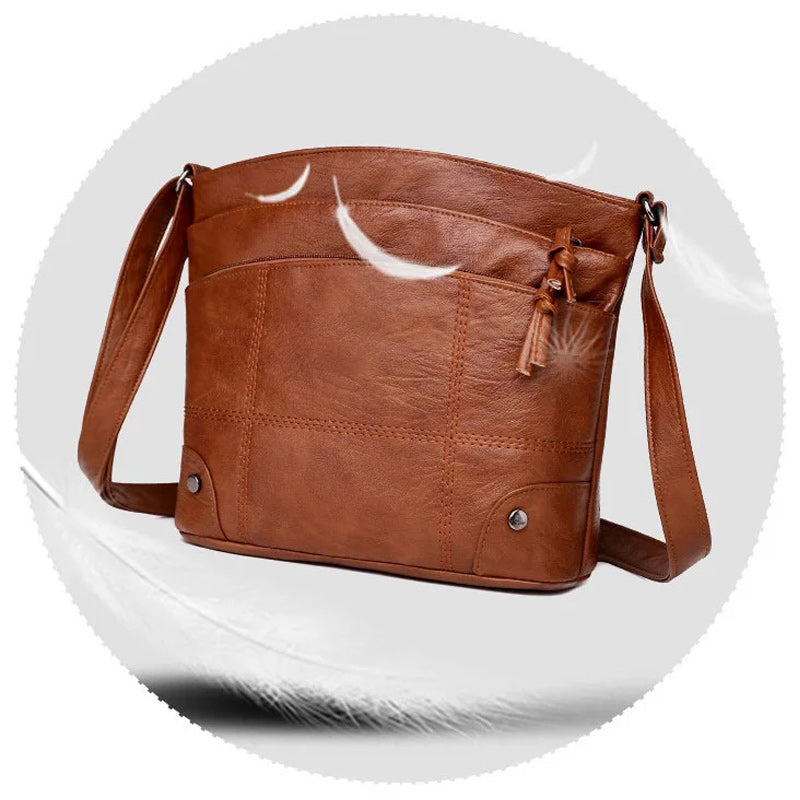 Zacht lederen schoudertas met meerdere vakken en grote capaciteit