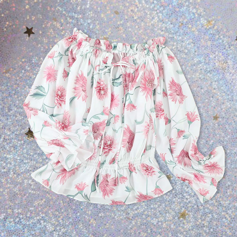 Blouse met ruches aan de mouwen en bloemen